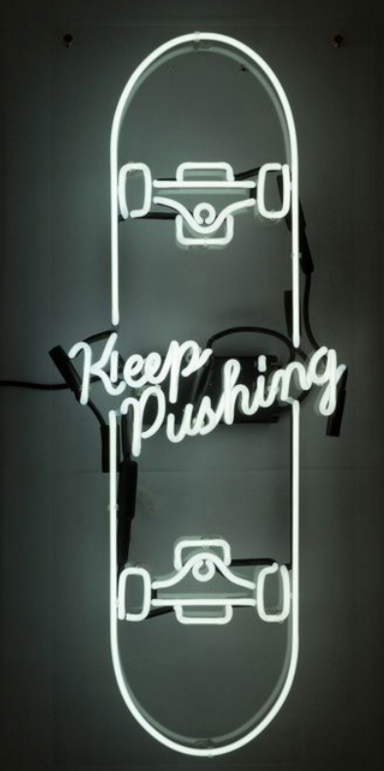 keep pushing neon sign
